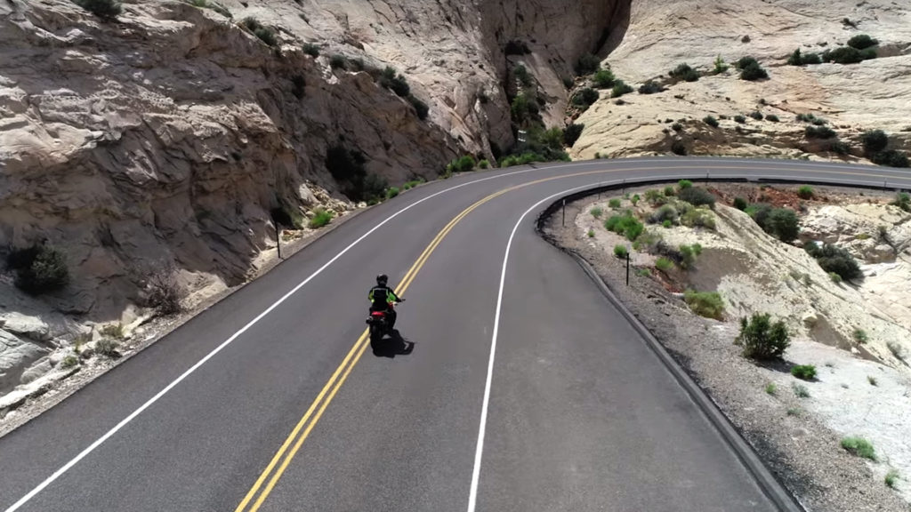 motorcycle entering corner wide