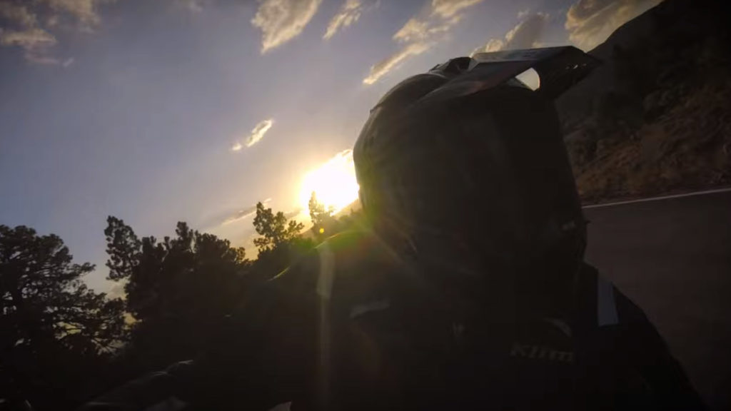 motorcycle riding at sunset