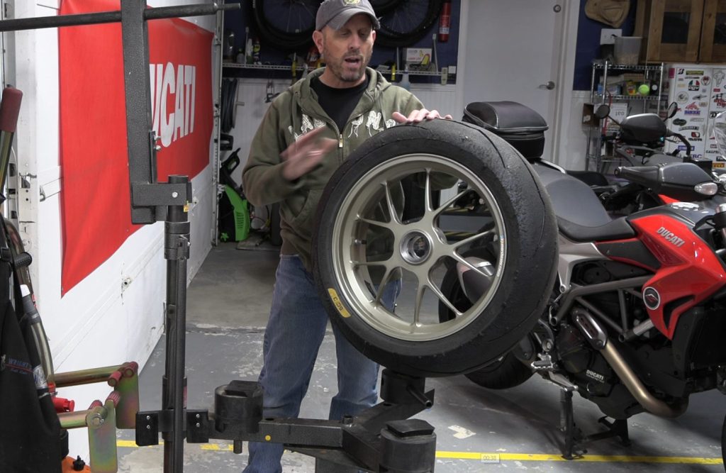 Before Removing A motorcycle tire from a wheel