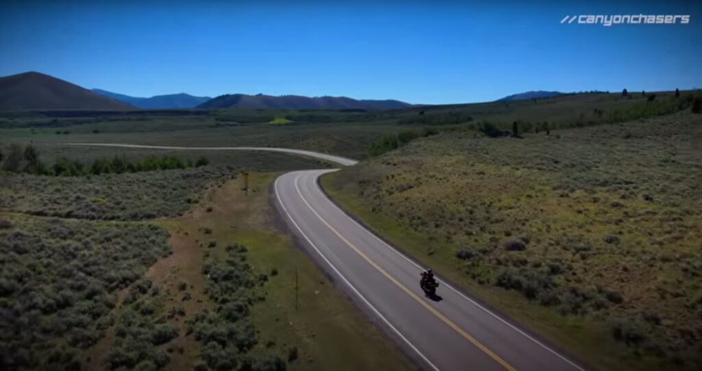 Motorcycle riding into a blind corner