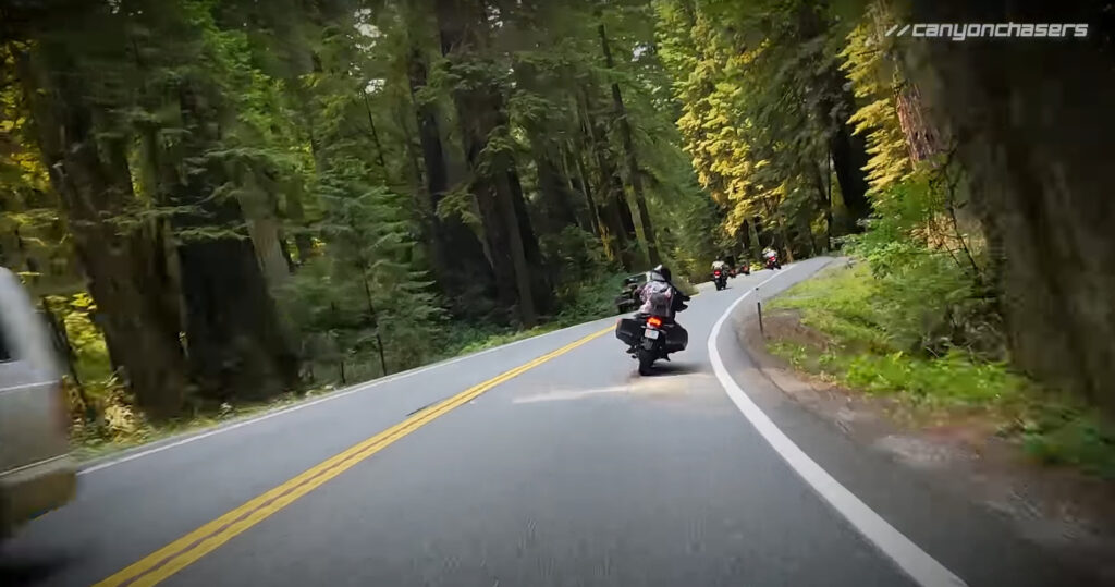 Motorcycles riding on a super pretty mountain road