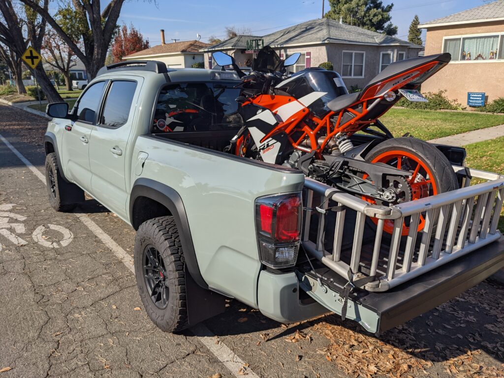 KTM RC390 in the back of a Toyota Tacoma Pickup