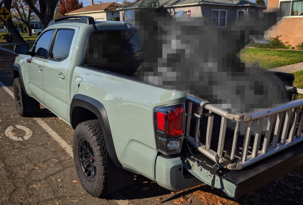 Mystery Motorcycle in the back of a Toyota Tacoma Picup