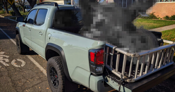 Mystery Motorcycle in the back of a Toyota Tacoma Picup