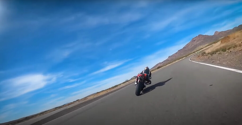Motorcycle going into a corner on a race track