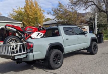 motorcycle in the back of a toyota tacoma
