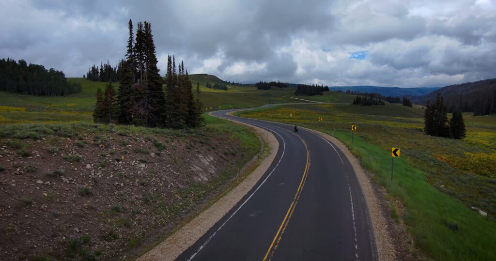 Motorcycle riding twisty mountain road