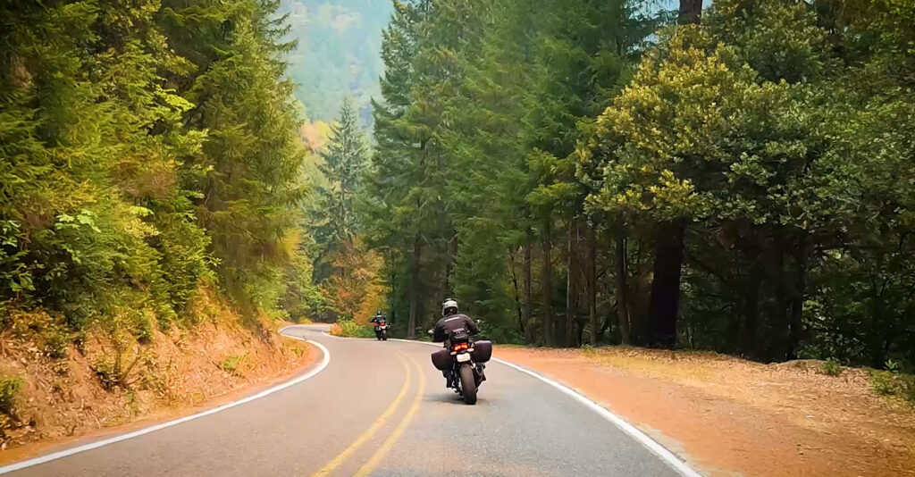 Motorcycle on tight, narrow road