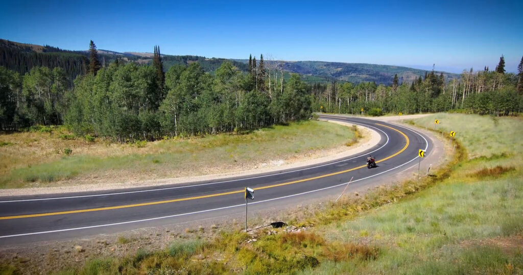 Motorcycle riding through a long corner