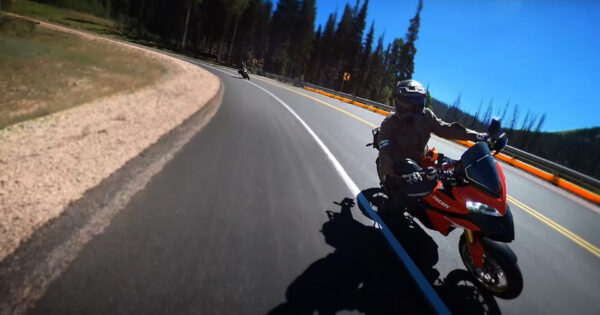 motorcycle couple riding together