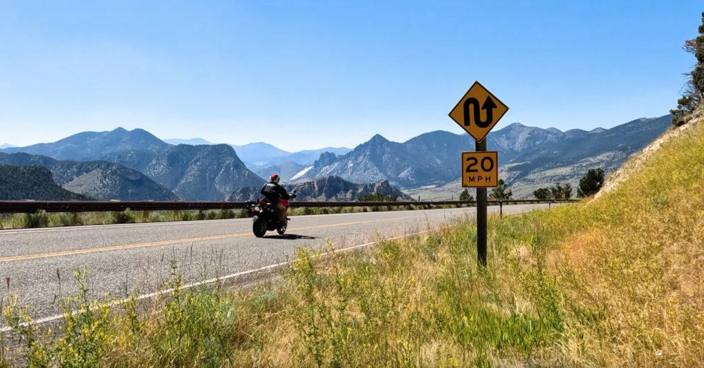 corner speed advisory sign motorcycle riding chief joseph highway in wyoming