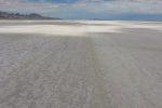 The Bonneville Salt Flats stretching to the horizon under a wide sky