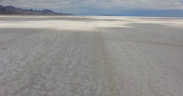 The Bonneville Salt Flats stretching to the horizon under a wide sky