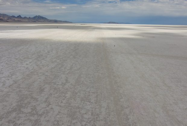 The Bonneville Salt Flats stretching to the horizon under a wide sky