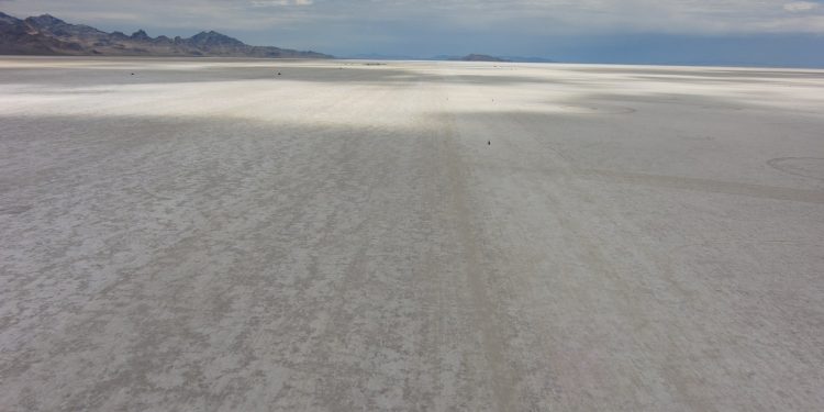 The Bonneville Salt Flats stretching to the horizon under a wide sky