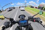 POV from a Triumph Trident in traffic showing the Chigee AIO-6 display and radar mirrors