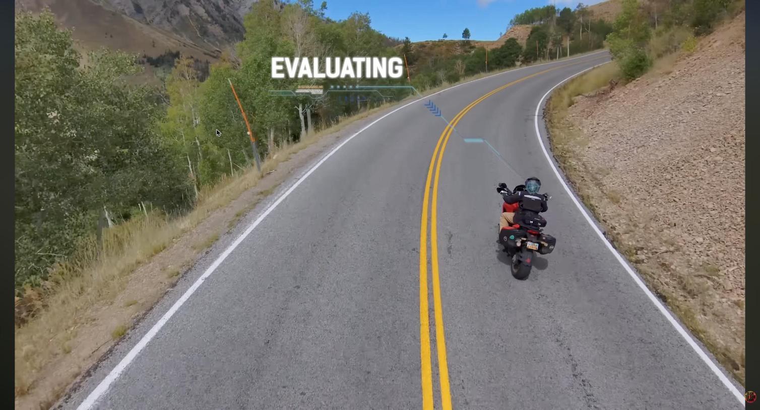 A rider mid-corner in the evaluation phase, gathering information before the decision point