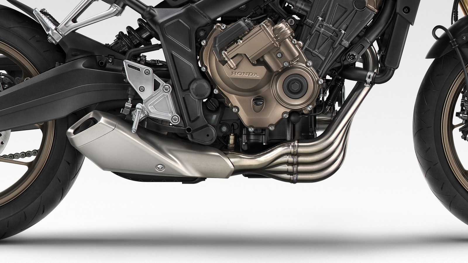 Detail of the Honda CB650R inline-four engine and its waterfall exhaust headers
