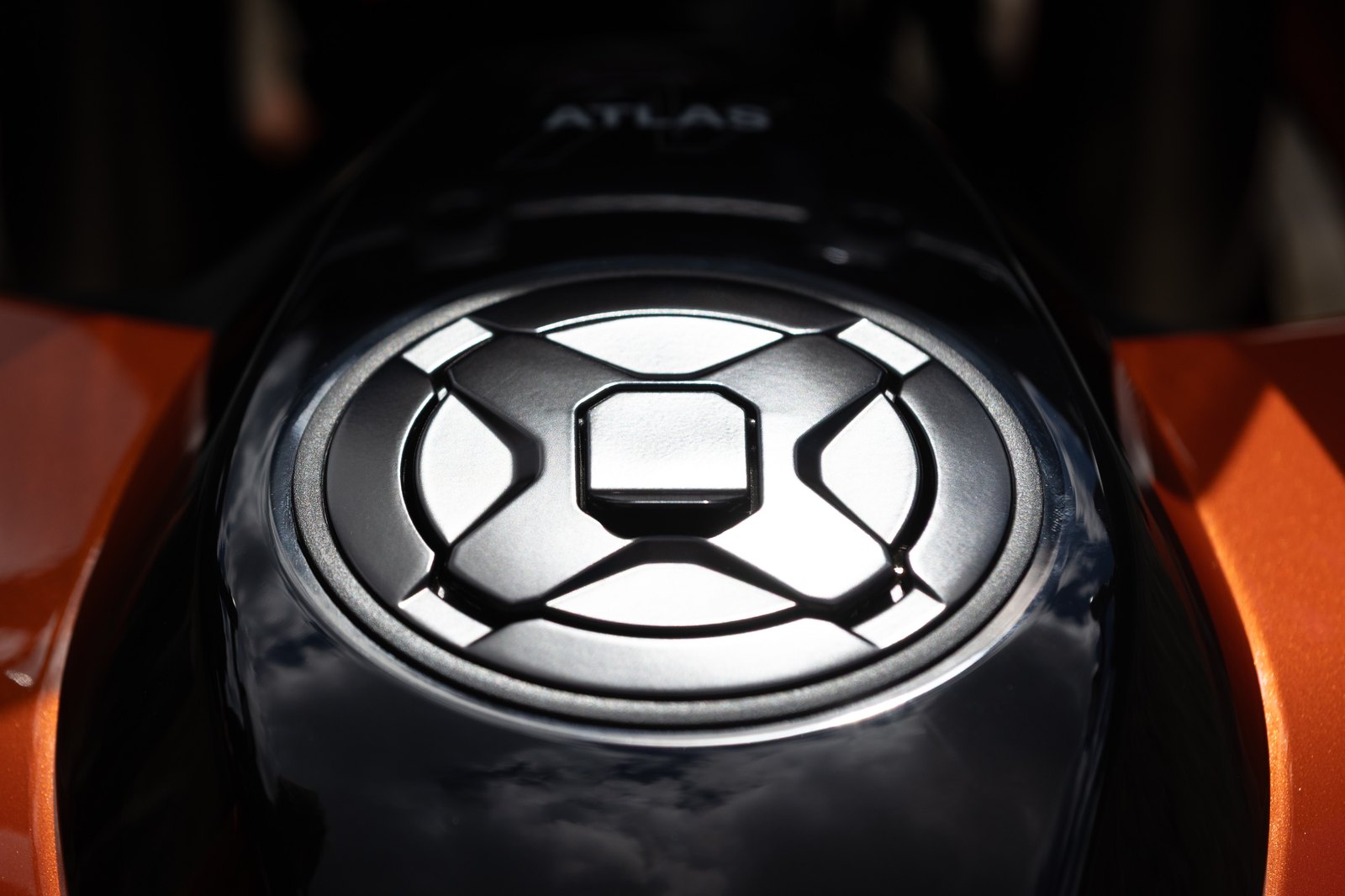 Norton Atlas keyless fuel cap on the orange tank