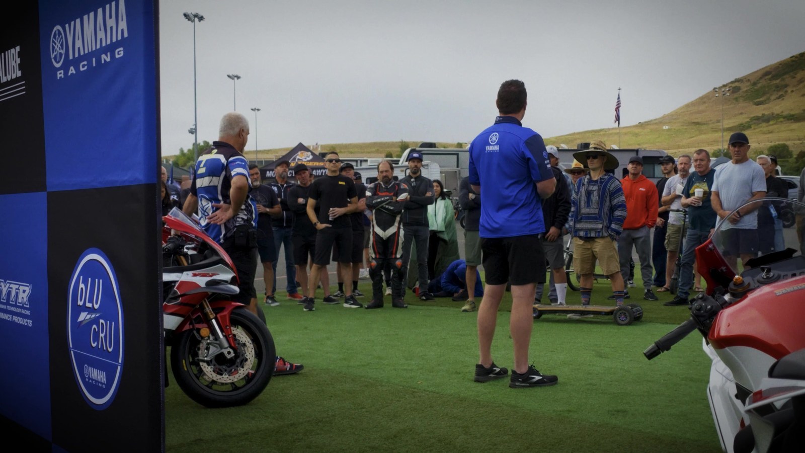 Riders meeting. Everybody here is about to go find out something about their motorcycle, and most of them brought the obvious tool.