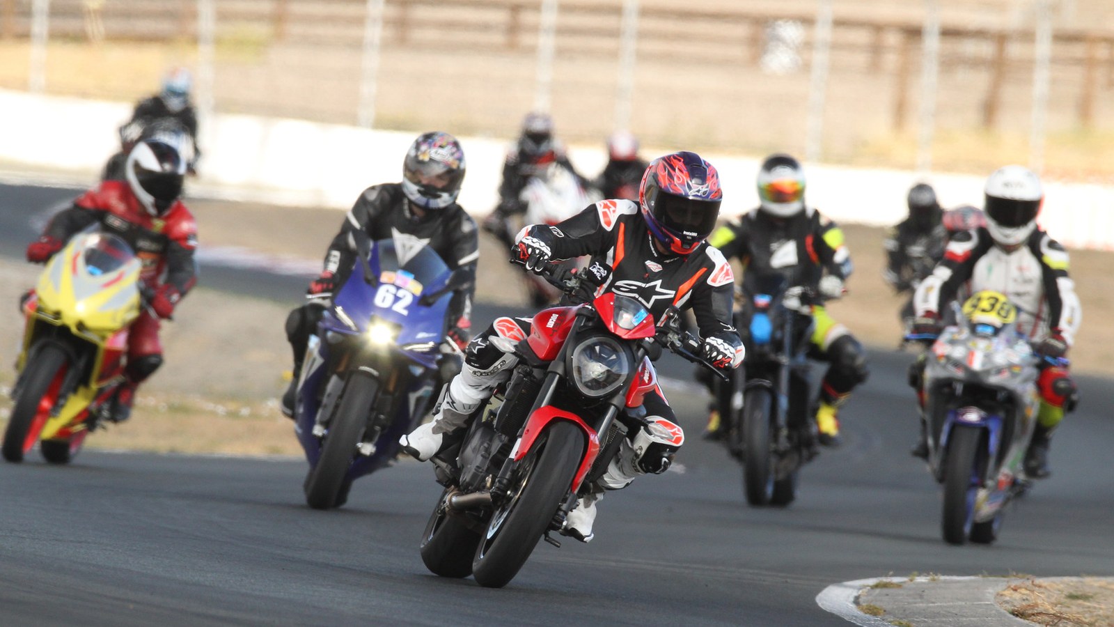 A naked middleweight, in traffic, at Sonoma, on street tires. Nothing about this is a problem.