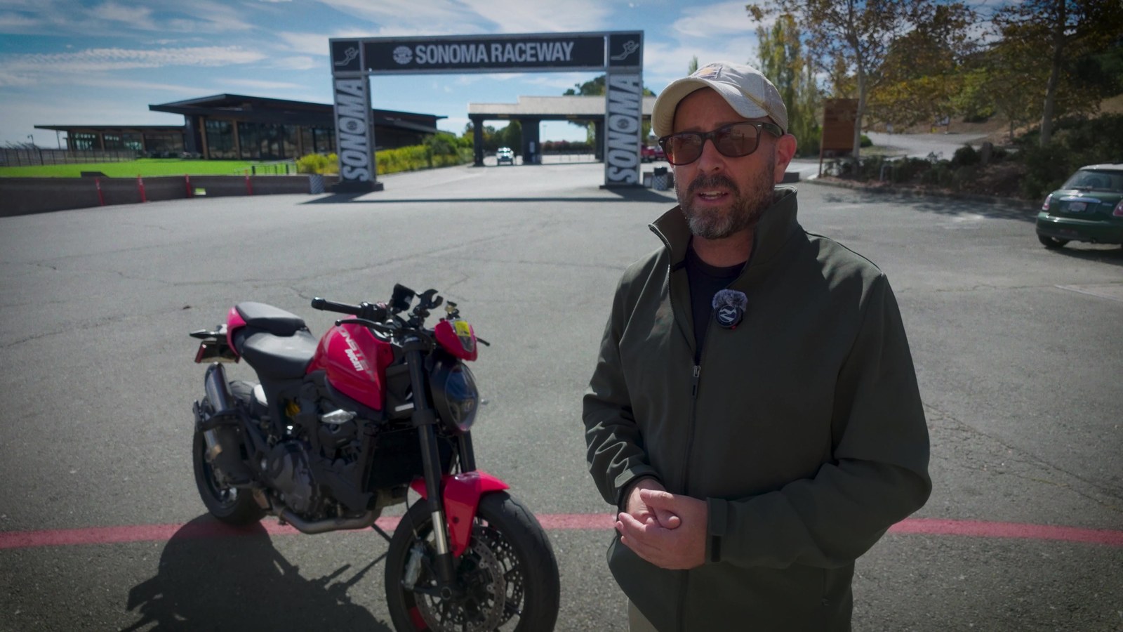 A 2024 Ducati Monster Plus at the gates of Sonoma Raceway. On paper this is the wrong tool. That was rather the point.