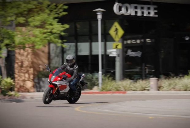 2026 Yamaha R7 riding through town, three-quarter front view