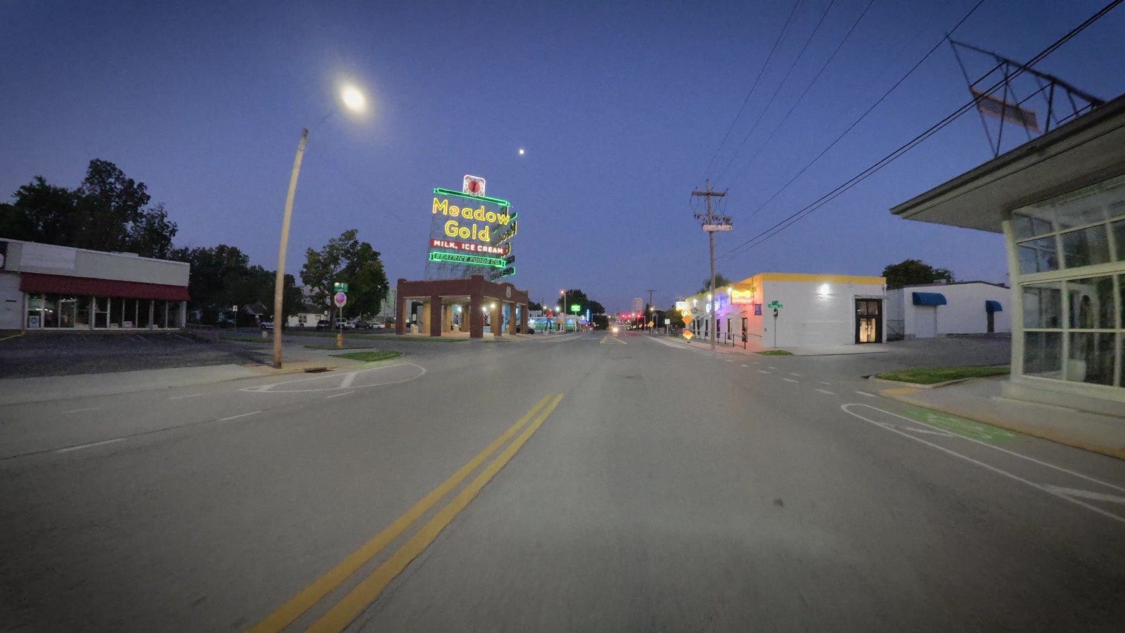 The Meadow Gold sign, Tulsa, before the town woke up.