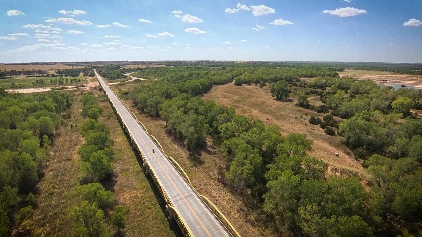 The Pony Bridge over the Canadian River. Thirty-eight spans, three quarters of a mile, and the reason three towns disappeared.