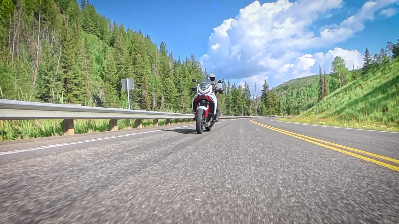 Moto Morini X-Cape 1200 riding along a mountain highway