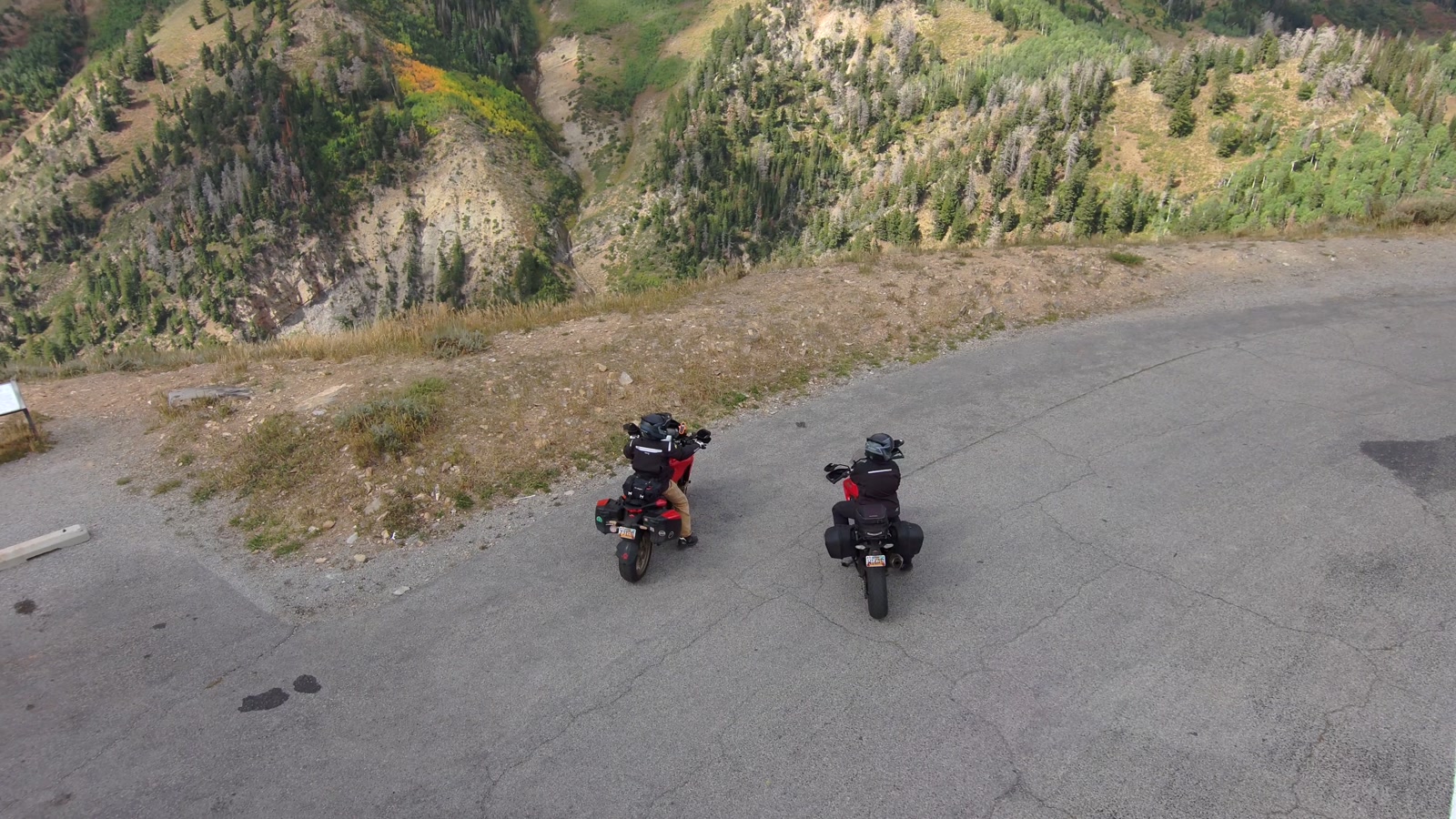 An orbit over the bikes at a pullout, one tap on the watch.