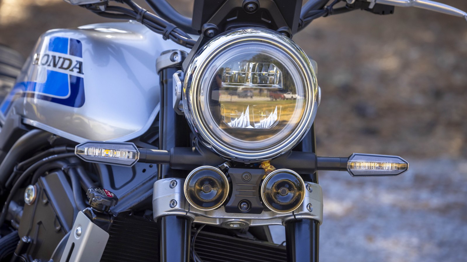 Twin horns under the headlight, as on the original, tuned to different notes.