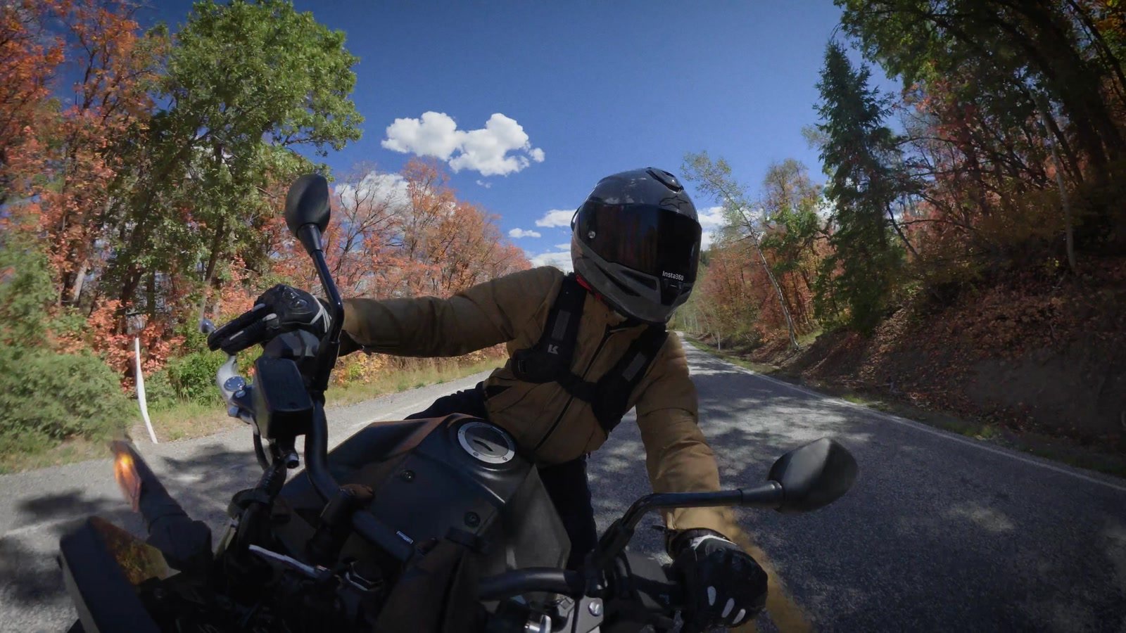 Downshifting mid-corner without touching the lever. The E-Clutch and ride-by-wire handle the rev match.