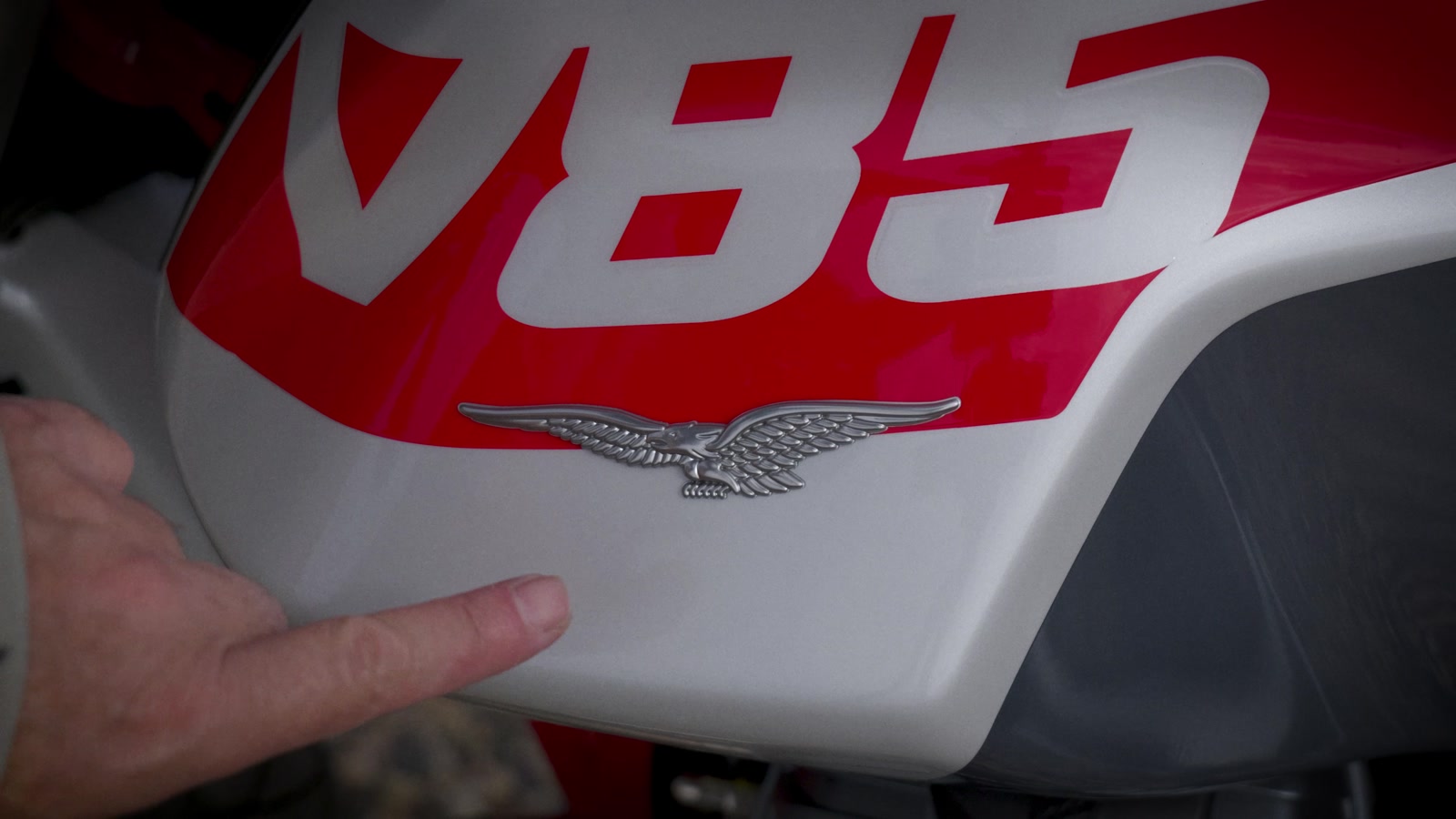 The metal eagle flies forward on both sides of the tank.