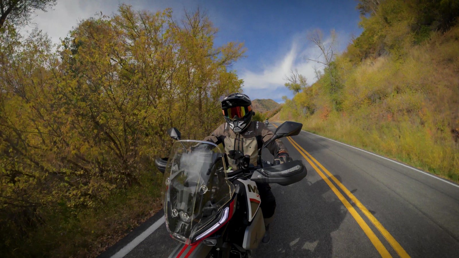 Moto Morini Vettore 450 leaning through a two-lane mountain road corner